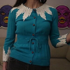 OG Moth Anthropologie cardigan with leaf / feather / wing detail